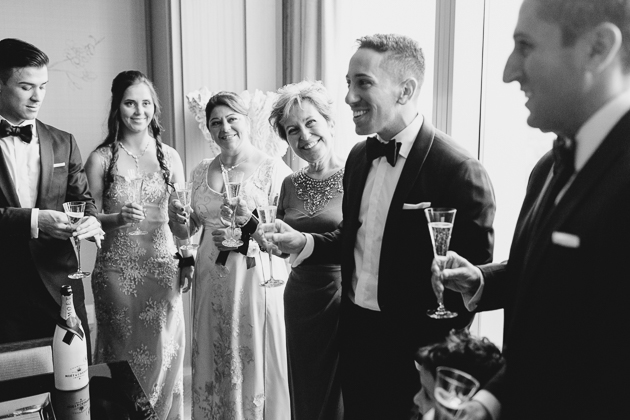 Family celebrating the wedding day before the ceremony at Four Seasons Hotel 